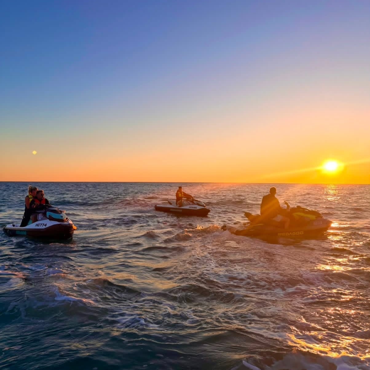 Jetski riding ocean waves